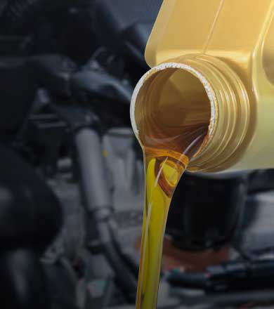 zoomed view of oil being poured